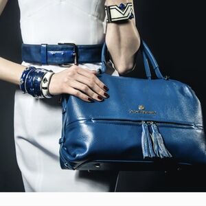 Elegant Blue Travel Bag with Gold Hardware